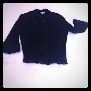 Dressy black collared shirt.